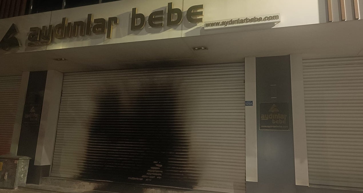 yer bursa magazayi kundaklamaya calisti o anlari cep telefonu kamerasiyla kaydetti UcSvLxJk